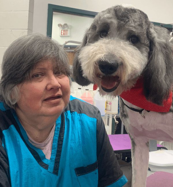 Andrea with a freshly groomed client