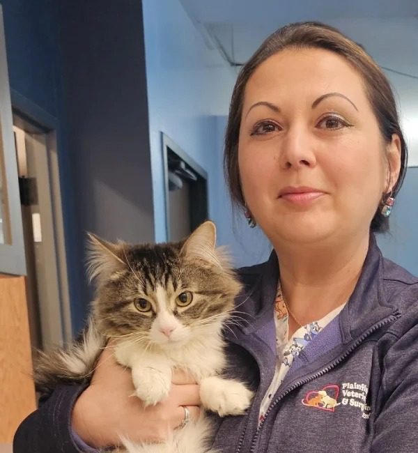 Delia with her cat named Mimi