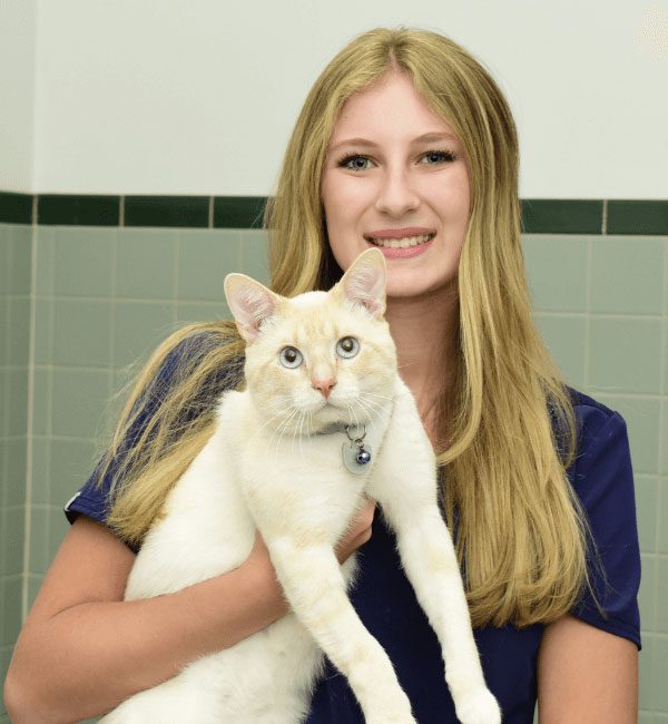 Kaylee with a white cat
