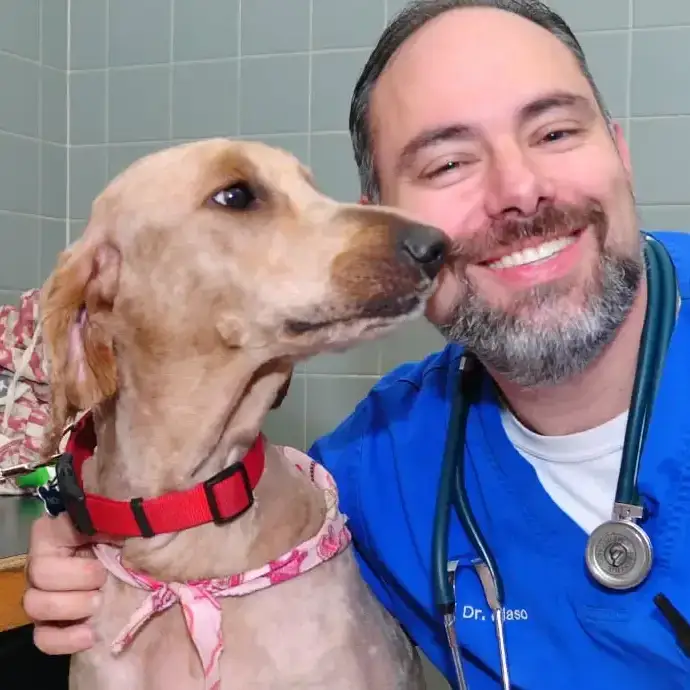 Dr. Blaso with a dog